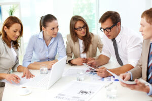 Business colleagues analyzing the results of the financial period together