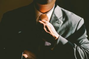 man showing his preparedness by dressing in a suit 