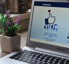 Facebook Advertising | A Laptop On A Table Showing A Log-In Page On Facebook