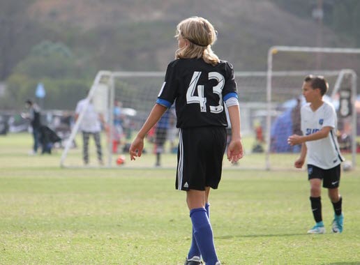 Soccer playing kid