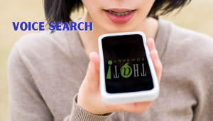 Optimize Voice Search | Woman Speaking Into Phone