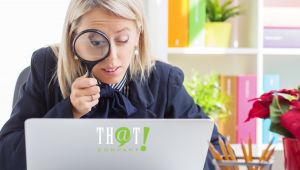 New Search Terms | Woman Using Magnifying Glass on Computer
