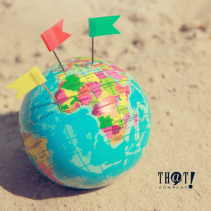 Local SEO For Google My Business | A Small Globe At the Sand With 3 Flags Colored Yellow, Red and Green Pinned At Different Map Locations