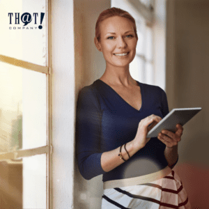 Local SEO for Business | A Woman Holding A Tablet Leaning on the Wall