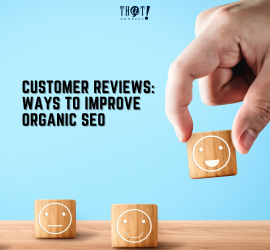Ways To Improve Organic SEO | A Hand Placing A Sad and Smiling Wooden Blocks On A Table