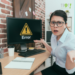 Identifying Errors | A Girl Sitting In Front of A Computer Showing an Error