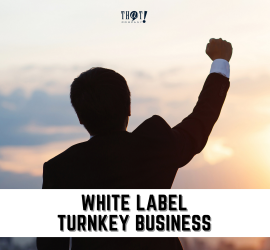 White Label | A Man Looking On A Sunset With Buildings Raising His Right Hand With Close Fist