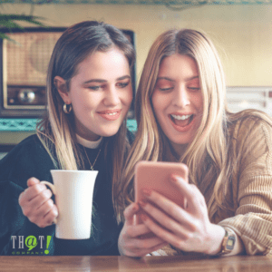 Bing Social Signals | 2 Girls Looking Happily at A Phone