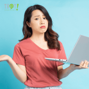 FAQ Rich Results | Puzzled Girl Holding A Laptop